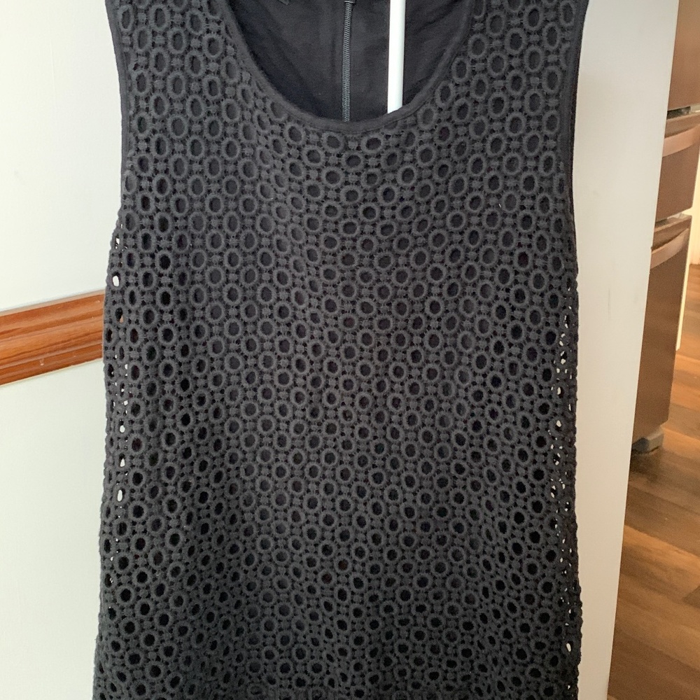 Talbots fully lined eyelet lace back zip top. Worn a bunch but in good shape!